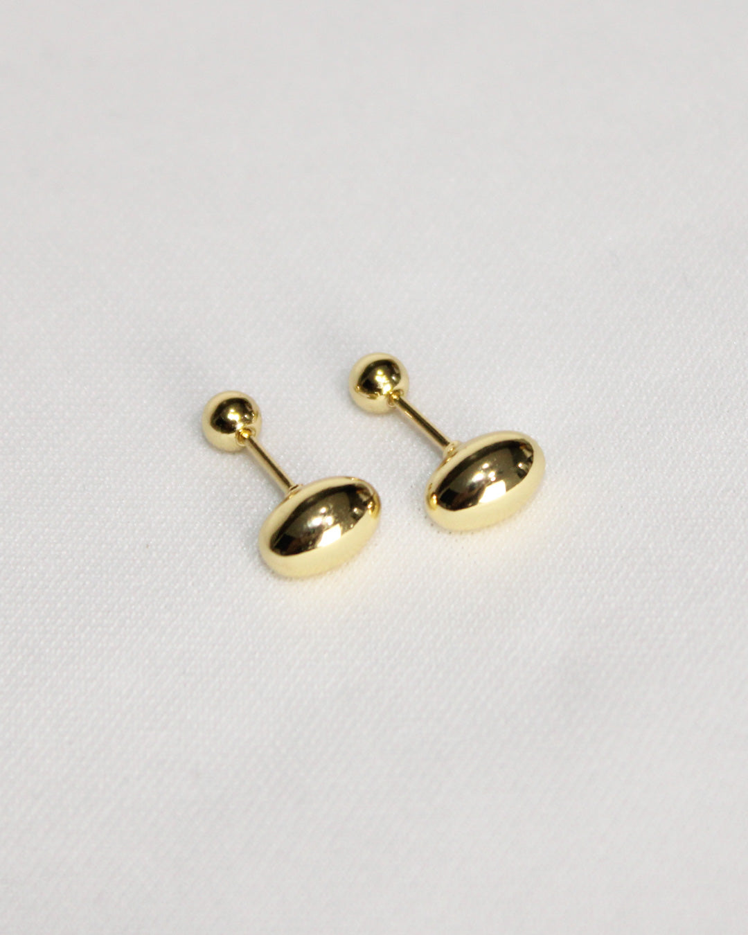 Aretes NUMA — oro laminado